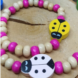 ensemble rose collier et bracelet en bois coccinelles pour enfant 2
