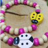 ensemble rose collier et bracelet en bois coccinelles pour enfant 2