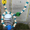Ensemble bleu collier et bracelet en bois coccinelles pour enfant
